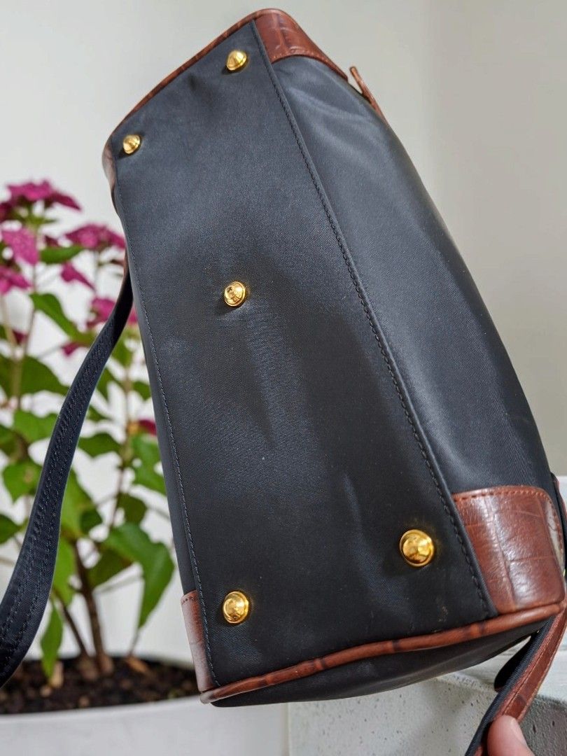 MEMORY COLLECTION 2WAY NYLON BOSTON BAG (Category: Cross-body Bags) located in Las Pinas. Submitted by annachiaonair2037 (Listing ID 1464883830, Image 3). Description: MEMORY COLLECTION NYLON 2WAY BOSTON BAG FROM JAPAN NYLON WITH GENUINE CROC LEATHER TRIM MADE IN INDONESIA YKK ZIP DETACHABLE STRAP H 8" L 11.5" W 5.5" Disclaimer: I am not affiliated with, associated with, or authorized by any of the brands featured posted. Any mention of brand nam