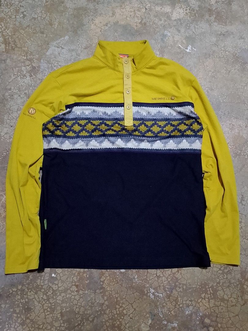 Merrell Long Sleeve Button Neck Pullover Yellow Navy Size L (Category: Coats, Jackets and Outerwear) located in Mandaue City. Submitted by thriftsyap (Listing ID 1464897564, Image 1). Description: - Brand: Merrell - Style: Long sleeve color block pullover shirt - Colors: Mustard yellow and dark navy blue - Features: High collar with button placket, patterned geometric chest band, embroidered branding on chest and sleeve, and small green 'M-Wick' 