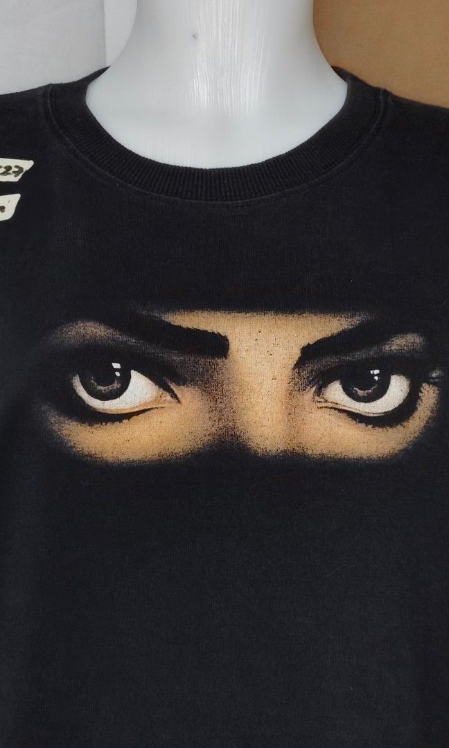 Michael Jackson "Dangerous World Tour 1992–93" Tee (Category: Tshirts & Polo Shirts ) located in Caloocan City. Submitted by jmedalla1958179 (Listing ID 1464914176, Image 2). Description: Front: Iconic eyes graphic from the Dangerous album artwork. 👉Back: "Michael Jackson King of Pop" crown logo with full tour city list. 📏Size & Dimension : Large / 20x27 CR : 9/10, no issue print fully intact, Heavy cotton 📌 Authenticity of design/licensing is