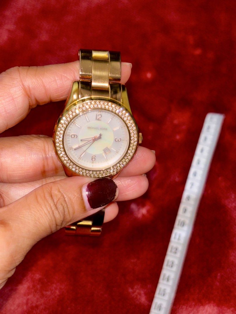 Michael Kors MK-5403 Gold Chronograph Watch (Category: Women's Watches) located in Manila. Submitted by maizhel (Listing ID 1464880146, Image 1). Description: For sale: Mk watch model:mk5403 for only 4000pesos no box and in good condition, with dents signs of usage.. RFS: bawas watch may paparating na namn ksi galing japan 🇯🇵 Loc: montalban rizal Delivery: lalamove/j&t Mop:gcash - Brand: Michael Kors - Model: MK-5403 (Gold-Tone Chronograph) - M