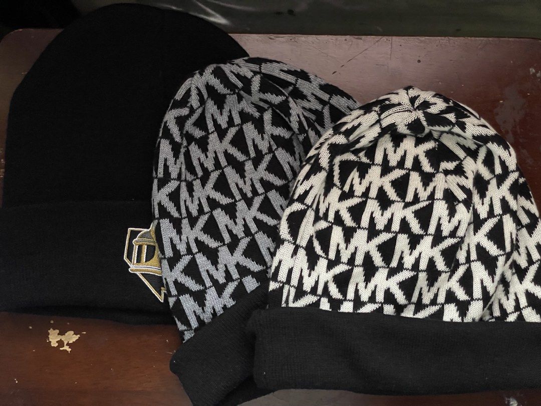 Michael Kors MK Monogram Knit Beanie Hat (Category: Hats & Beanies) located in Manila. Submitted by d.twins_18 (Listing ID 1464864258, Image 1). Description: - Brand: Michael Kors - Design: Classic all-over MK monogram pattern - Colors available: Grey/Black and White/Black - Material: Soft 100% acrylic for maximum comfort and warmth - Care instructions: Hand wash cold separately, lay flat to dry - Origin: Made in China - Condition: Brand new, per