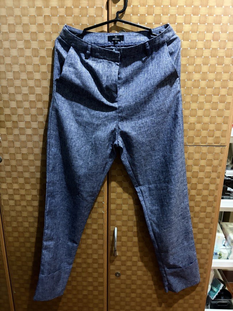 Michaela Blue Marl Casual Trousers Size S (Category: Jeans) located in Pangil. Submitted by chel_anne (Listing ID 1464843701, Image 2). Description: - Brand: Michaela - Size: S (tag attached at waistband) - Color: Blue marl - Details: Textured fabric, straight leg cut, folded cuffs at hem - Features: Front pockets, belt loops, zip fly with button closure - Condition: Clean, brand new with tags.