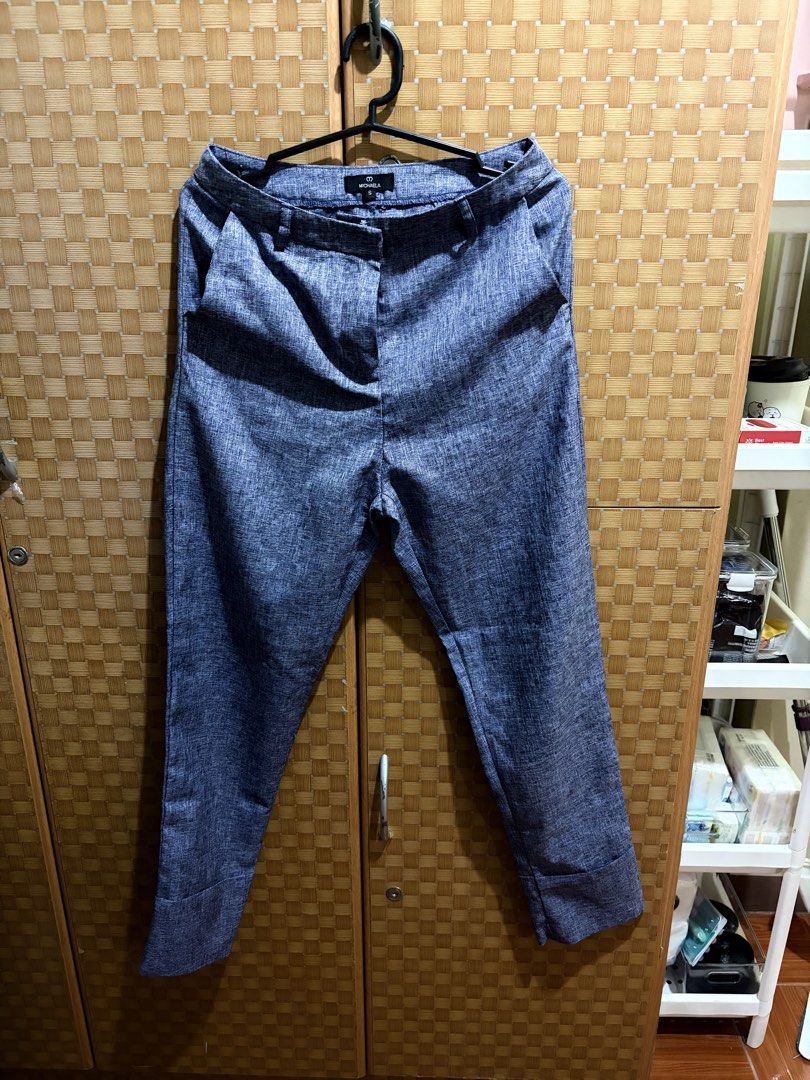 Michaela Blue Marl Casual Trousers Size S (Category: Jeans) located in Pangil. Submitted by chel_anne (Listing ID 1464843701, Image 1). Description: - Brand: Michaela - Size: S (tag attached at waistband) - Color: Blue marl - Details: Textured fabric, straight leg cut, folded cuffs at hem - Features: Front pockets, belt loops, zip fly with button closure - Condition: Clean, brand new with tags.