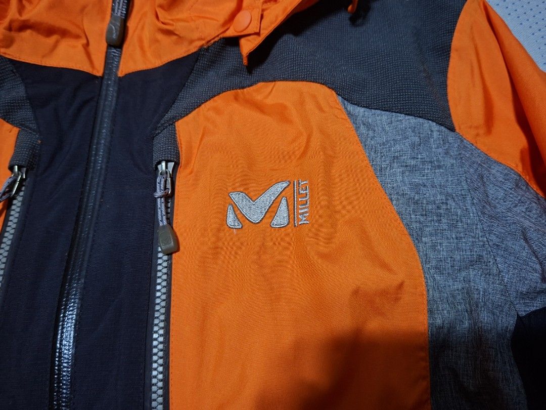 Millet Hardshell Outdoor Jacket (Category: Coats, Jackets and Outerwear) located in Agdangan. Submitted by jrmygrrr (Listing ID 1464885186, Image 3). Description: Dimes: 21x27 Color: Orange/Black/Grey Hardshell Good as new No issues .