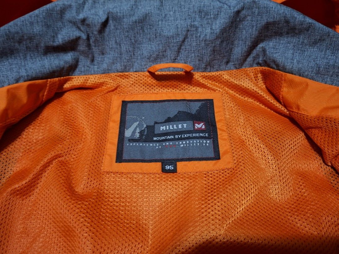 Millet Hardshell Outdoor Jacket (Category: Coats, Jackets and Outerwear) located in Agdangan. Submitted by jrmygrrr (Listing ID 1464885186, Image 2). Description: Dimes: 21x27 Color: Orange/Black/Grey Hardshell Good as new No issues .