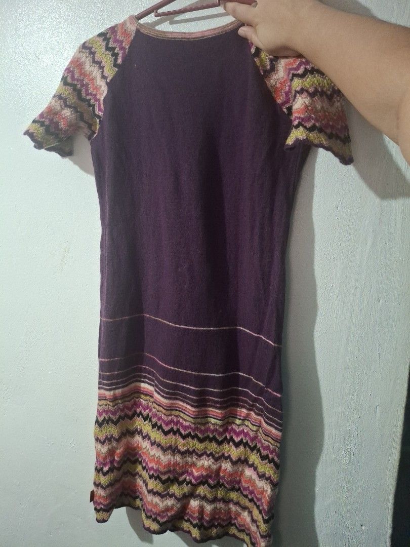 Missoni Knit Dress Purple Zigzag Pattern Size M (Category: Dresses) located in Quezon City. Submitted by 042361 (Listing ID 1464802273, Image 1). Description: - Will be given free if you buy minimum of 3 - Has a hole in the middle - Brand: Missoni - Color: Dark purple with multicolored zigzag chevron details - Design: Round neckline with pink trim, short sleeves, branded interior tag - Fit & Fabric: Soft, stretchy knit fabric with a beautiful dra