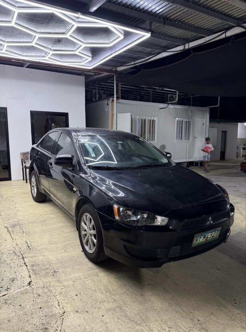Mitsubishi Lancer 1.6 EX (A) (Category: Used Cars) located in Quezon City. Submitted by Moms_closet (Listing ID 1464832290, Image 1). Description: Lancer EX GLX 2013 Automatic transmission 37k mileage original “pwede scan or check sa casa” First Owner acquired Fresh inside and out Original paint! ₱315,000 slightly negotiable.