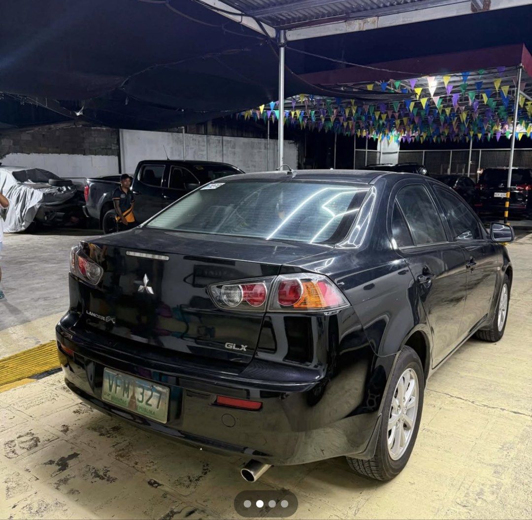 Mitsubishi Lancer 1.6 EX (A) (Category: Used Cars) located in Quezon City. Submitted by Moms_closet (Listing ID 1464832290, Image 2). Description: Lancer EX GLX 2013 Automatic transmission 37k mileage original “pwede scan or check sa casa” First Owner acquired Fresh inside and out Original paint! ₱315,000 slightly negotiable.