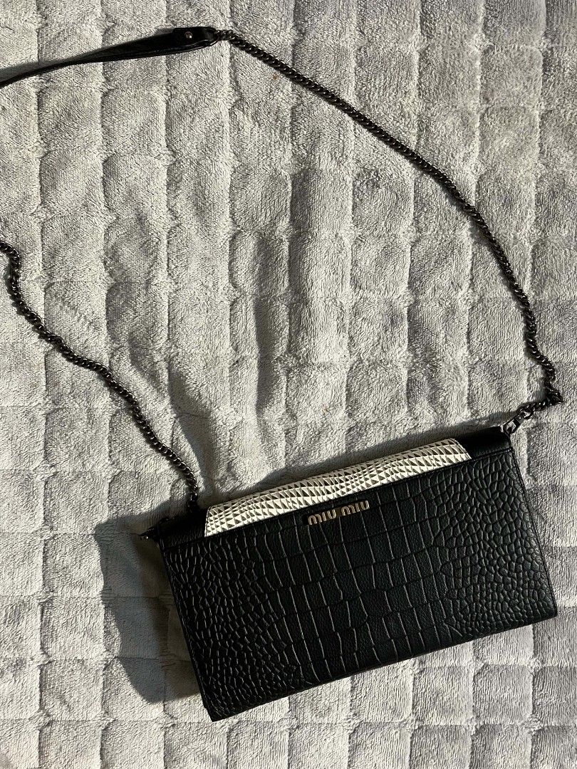 Miu miu (Category: Luxury Bags & Wallets) located in Manila. Submitted by zenwind_3cdc42 (Listing ID 1464856818, Image 1). Description: Miu Miu St. Cocco Lux Crocodile-Embossed Leather Wallet on Chain (WOC) / Flap Clutch. • Excellent Condition • Free Shipping • Wallet on chain • Details On picture DM me or comment down below to claim.