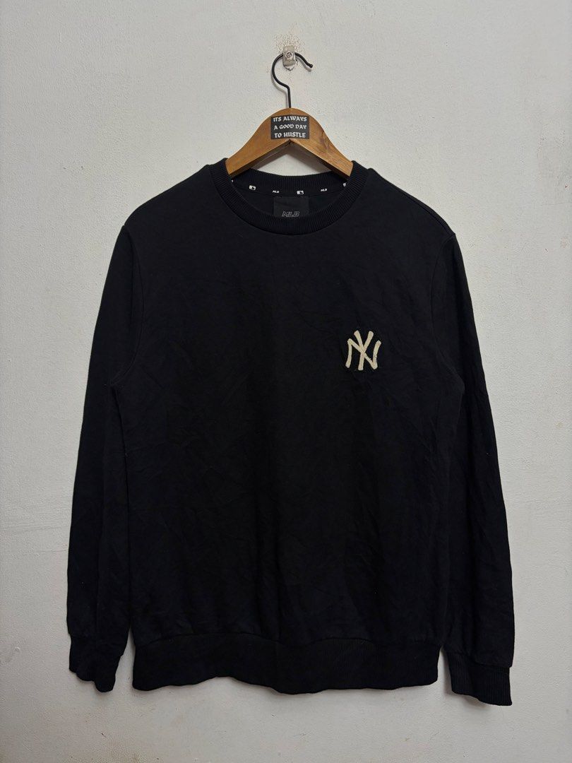 MLB New York Yankees Black Sweatshirt (Category: Coats, Jackets and Outerwear) located in Bulacan. Submitted by chrlzchrstnfntn33 (Listing ID 1464865499, Image 1). Description: - Brand: MLB New York Yankees - Item: Sweatshirt / Pullover - Color: Black with white embroidered NY logo - Size: S (Tagged) - Material: Cotton and polyester blend - Details: MLB logo patch on back collar, ribbed cuffs, collar, and hem - Condition: Excellent / Pre-loved (r