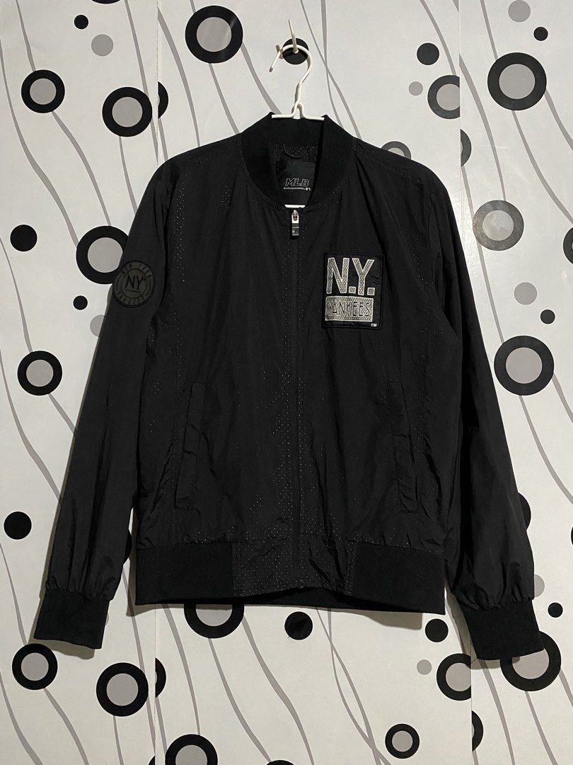 MLB New York Yankees bomber or blouson-style jacket. (Category: Coats, Jackets and Outerwear) located in Cebu City. Submitted by patspickph (Listing ID 1464823964, Image 1). Description: This is a black MLB New York Yankees bomber or blouson-style jacket. Dimensions is W21 L26. Good As New Excellent Condition No issue👍👌.