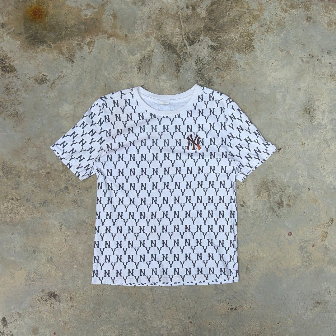 MLB NY aop (Category: Tshirts & Polo Shirts ) located in Ozamiz City. Submitted by drithrft (Listing ID 1464878502, Image 1). Description: MLB NY aop Dimensions (inches) Width - 17 Length - 23.5 Condition - 9/10 Issue - bleach stain on embroidered logo.