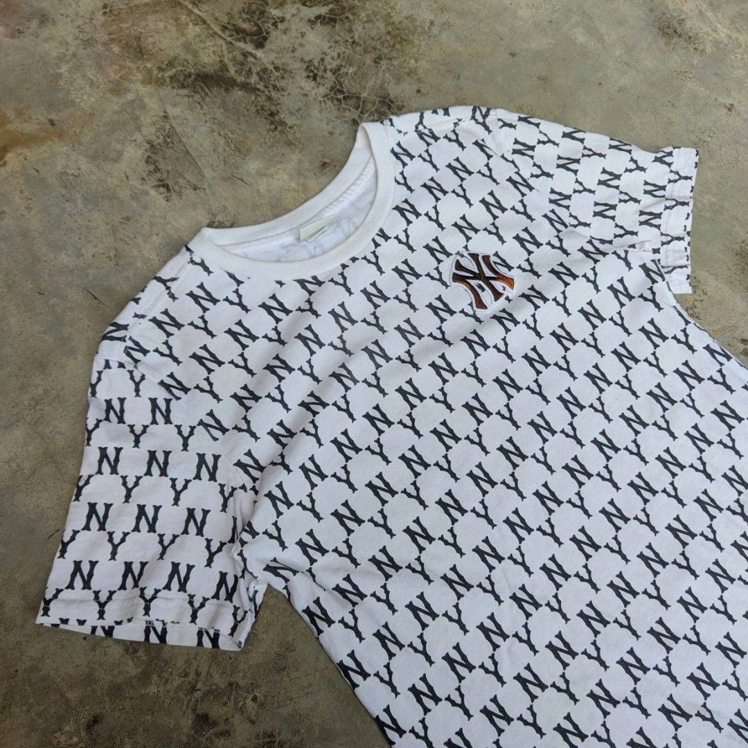MLB NY aop (Category: Tshirts & Polo Shirts ) located in Ozamiz City. Submitted by drithrft (Listing ID 1464878502, Image 2). Description: MLB NY aop Dimensions (inches) Width - 17 Length - 23.5 Condition - 9/10 Issue - bleach stain on embroidered logo.