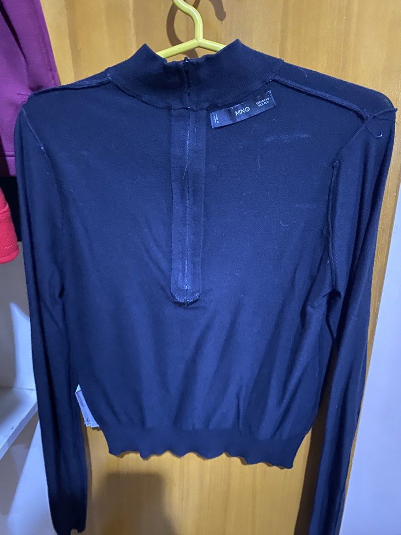 MNG Black Mock Neck Long Sleeve Top (Category: Longsleeves) located in Antipolo. Submitted by jl_2025 (Listing ID 1464873171, Image 2). Description: - Brand: MNG - Style: Black mock neck long sleeve top with zipper at the back - Size: XS - Details: Lightweight knit material Location: Antipolo Rizal RFS: Moving out Delivery shouldered by the buyer.
