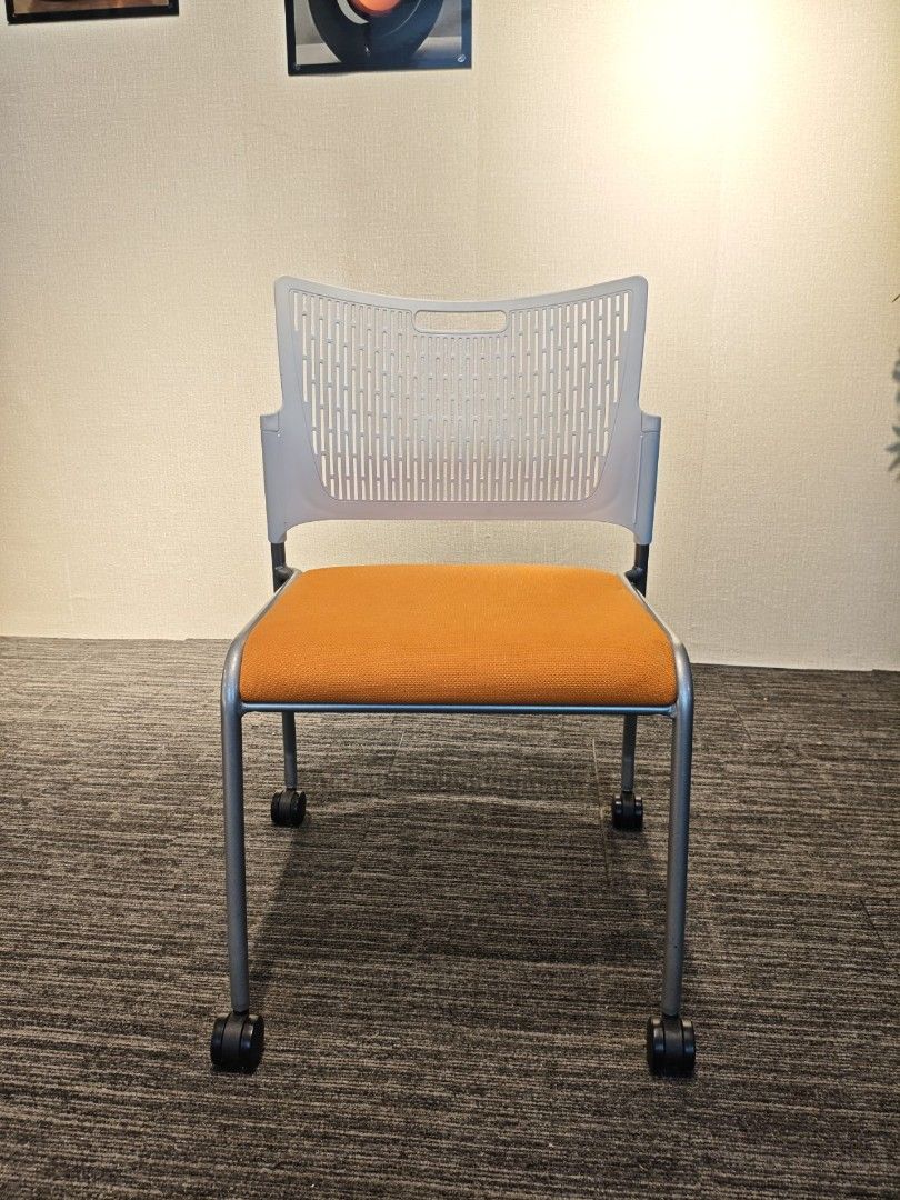 Modern Orange and White Office Chair with Wheels (Category: Office Furniture & Fixtures) located in Quezon City. Submitted by kevinmacabata12997160 (Listing ID 1464772549, Image 2). Description: - Vibrant bright orange fabric seat cushion for a pop of color - Breathable white plastic backrest - Grey KOKUYO office chair - Comfortable and ergonomic design - Swivels and has wheels for easy movement - Ideal for home office or study - Sturdy build you