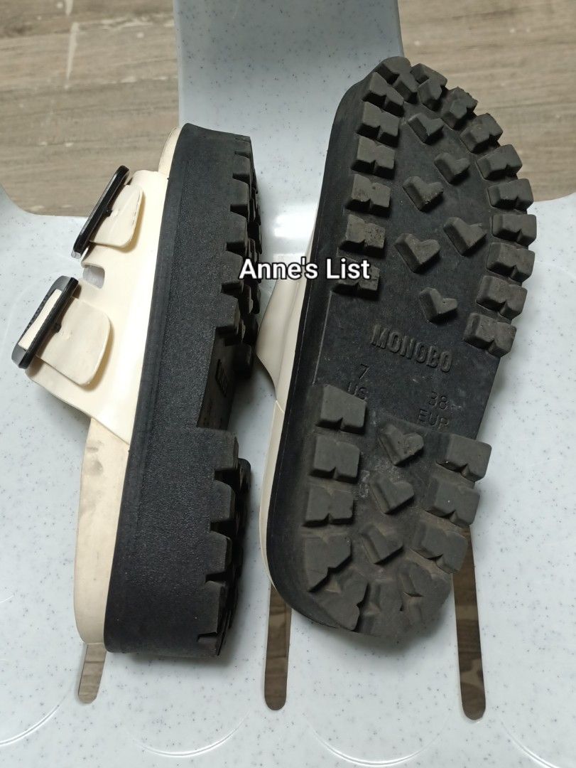 Monobo Sandals Size 38 Cream Black Platform (Category: Sandals) located in Santa Maria. Submitted by anne_s.list (Listing ID 1464784163, Image 2). Description: Monobo sandals in cream and black. Dual strap design with square buckles. Chunky platform sole with lug tread. Size 38 EUR / 7 US. Shows light dust and minor marks, needs a quick wash. Comfortable slip-on style with good grip on the bottom. #monobosandals #platform #doublestrap #jellysanda