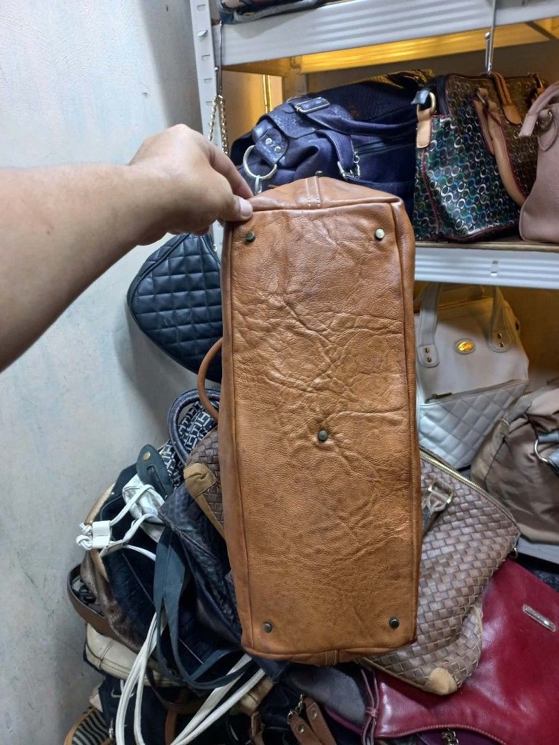 Monsac Brown Leather Tote Bag (Category: Tote Bags) located in Manila. Submitted by dei03_diz (Listing ID 1464939439, Image 3). Description: - Brand: Monsac - Material: Genuine Brown Leather - Interior: Roomy with stylish striped lining and a secure zip pocket - Exterior: Convenient back zip pocket for quick access - Hardware: Sturdy dual carry handles and protective bottom studs - Condition: Excellent / Ready to ship - Mode of Payment: GCash, .