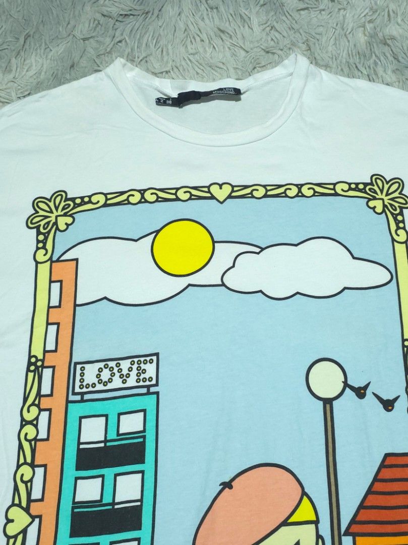 Moschino Oversized (Category: Tshirts & Polo Shirts ) located in Abulug. Submitted by humanwhosellthings (Listing ID 1464899922, Image 2). Description: MÒSCHINO Oversized T-Shirt ✅️Size: XLarge ✅️Dimes: 23W x 34L ✅Condition: Like New ✅Issue: None ✅Color Rate: 10/10.