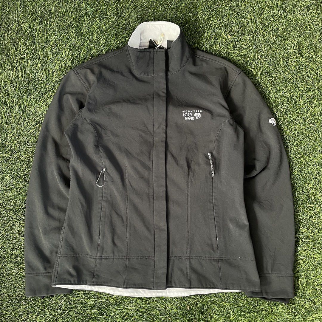 Mountain Hardwear Softshell Jacket (Medium) (Category: Coats, Jackets and Outerwear) located in Pasig City. Submitted by icie_finds (Listing ID 1464777206, Image 1). Description: Mountain Hardwear Softshell Jacket (Medium) SIZE: Fits Medium (Tag size M) DIMES: W 21.5 L 25 Model: Mountain Hardwear Fleece-Lined Softshell Jacket Style: Full-zip technical outdoor jacket with high mock neck collar, zippered hand pockets, and embroidered chest/sleeve l