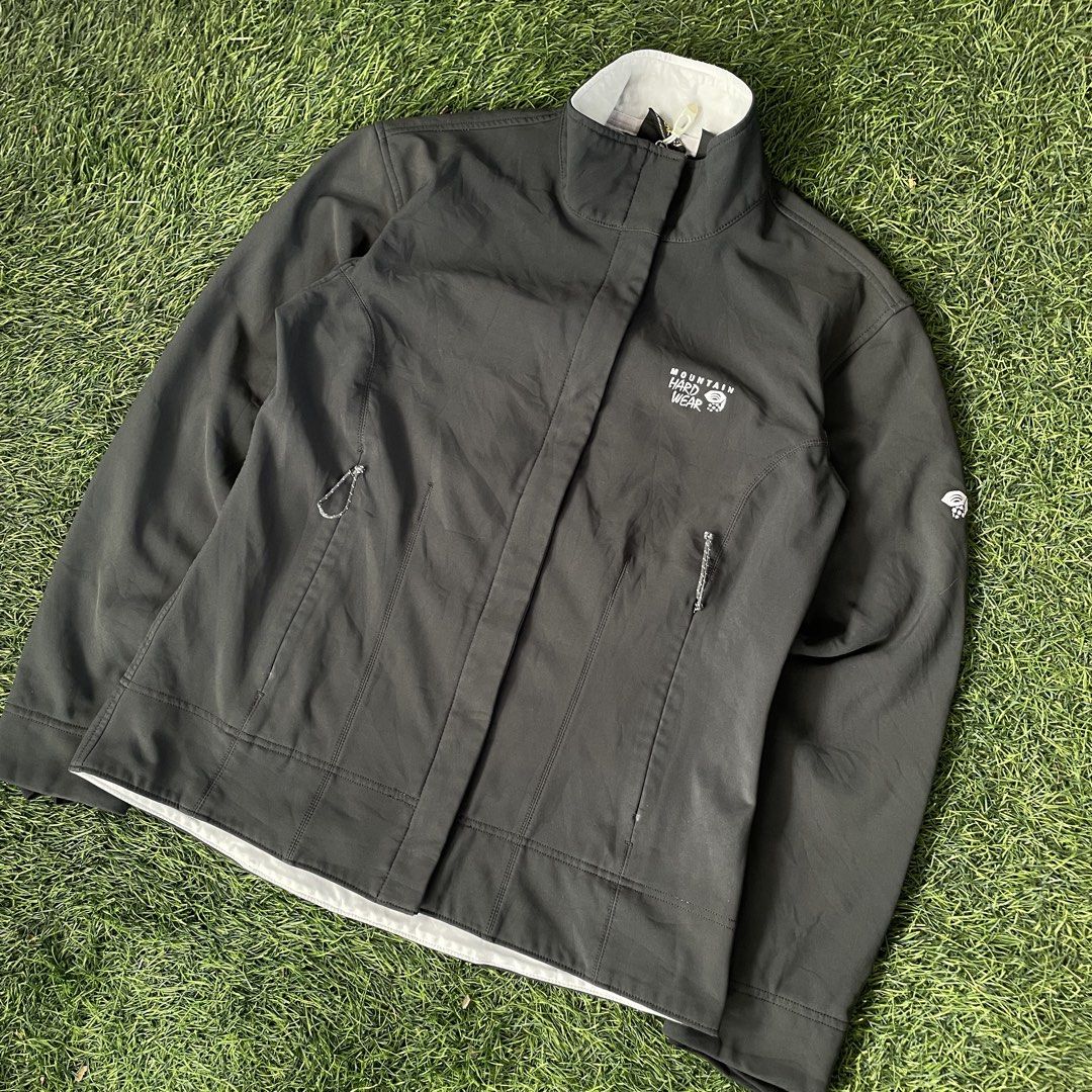 Mountain Hardwear Softshell Jacket (Medium) (Category: Coats, Jackets and Outerwear) located in Pasig City. Submitted by icie_finds (Listing ID 1464777206, Image 2). Description: Mountain Hardwear Softshell Jacket (Medium) SIZE: Fits Medium (Tag size M) DIMES: W 21.5 L 25 Model: Mountain Hardwear Fleece-Lined Softshell Jacket Style: Full-zip technical outdoor jacket with high mock neck collar, zippered hand pockets, and embroidered chest/sleeve l