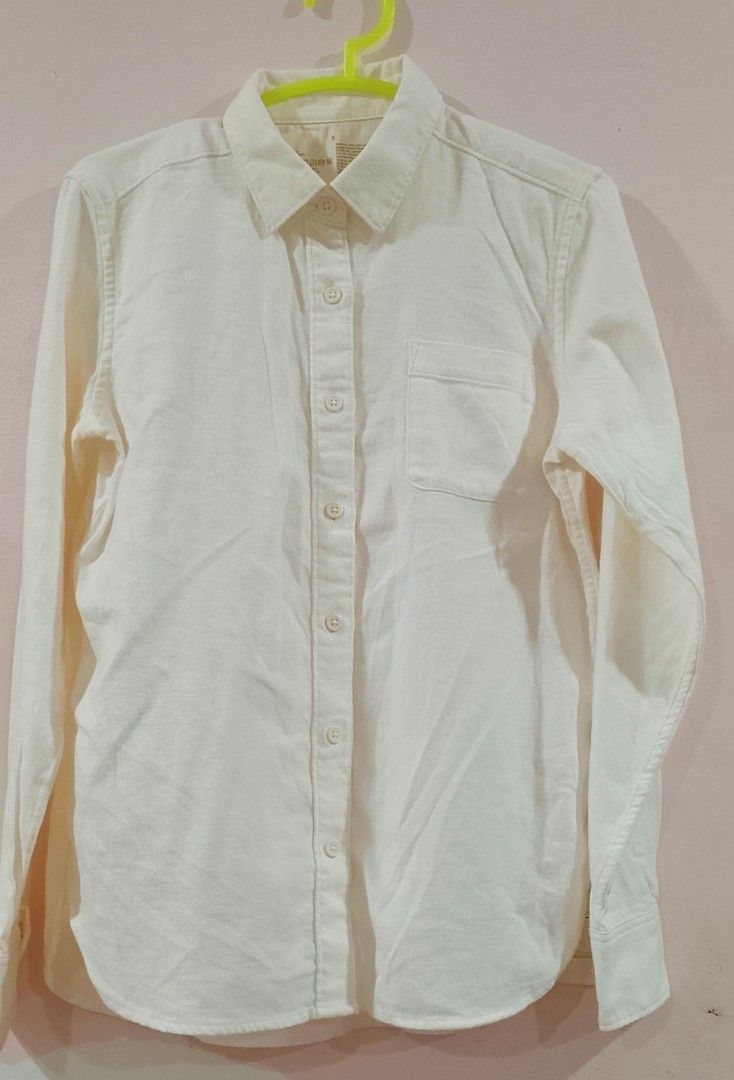 MUJI cream flannel shirt (Category: Longsleeves) located in Cabanatuan. Submitted by miss.maia (Listing ID 1464908471, Image 2). Description: This item is a MUJI cream flannel shirt, recognized for its soft, double-brushed cotton texture, minimal styling, single chest patch pocket, and slightly curved hem.