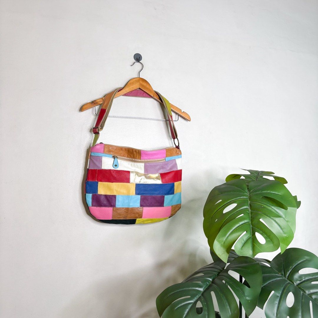 Multicolor Patchwork | Leather Hobo Bag. (Category: Cross-body Bags) located in Manila. Submitted by bypiecesandstories (Listing ID 1464881683, Image 2). Description: Multicolor Patchwork | Leather Hobo Bag. 799 PHP 🧡 Perfect Condition Dimensions — W 16" L 22" Can Carry — iPad • Wallet • Phone • Keys • Makeup & More A unique patchwork leather bag with a mix of textures and colors that makes every detail stand out. An easy statement piece to add 