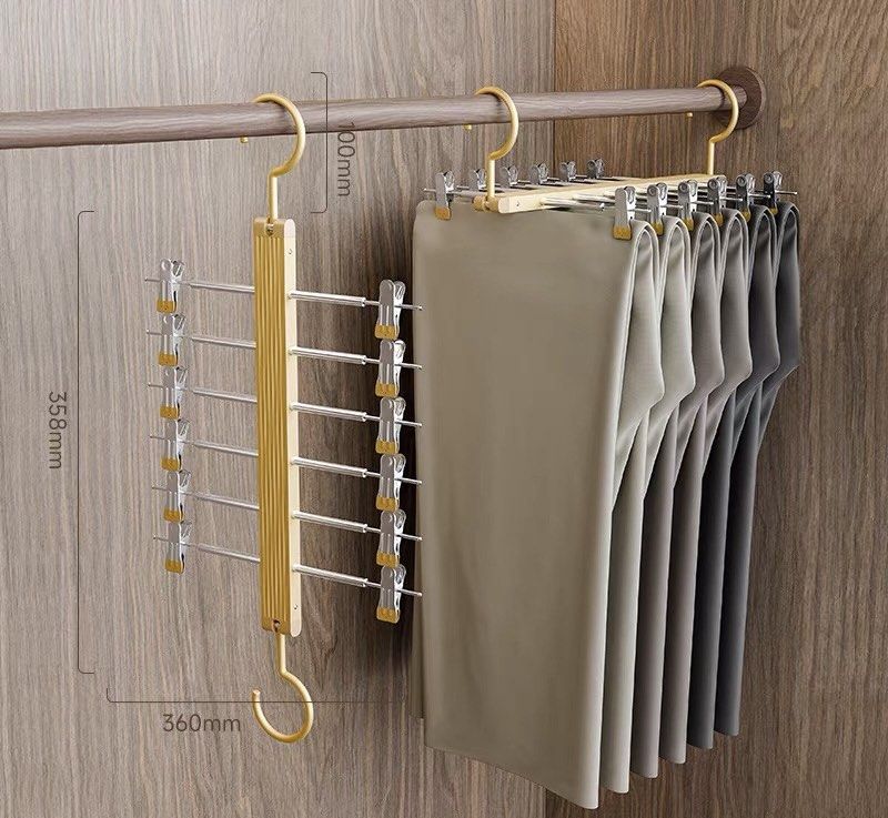 Multi-function Foldable Pants Hanger (Category: Hooks & Hangers) located in Kuala Lumpur. Submitted by 996chenxin69209 (Listing ID 1464887280, Image 1). Description: Brand new unused multi-function foldable hanger. Suitable for pants, skirts, bras, socks, innerwear etc. Can be hung horizontally or vertically to save wardrobe space. • 6 hanging bars / clips • 360° hanging design • Anti-slip clips • Foldable & space-saving • Approx. 360mm × 358mm •