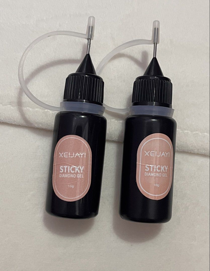 Nail set (incomplete) (Category: Hands & Nails) located in Manila. Submitted by sells_anything (Listing ID 1464813950, Image 2). Description: 28pcs wood stick and nail file 2pcs Sticky diamond rhinestone nail gel 4pcs Non stick hand extension gel - DU71 - DU73 - DU75 - DU76 UV LIGHT rechargeable (black) with charger 5pcs/set double ended nail art pen Nail gems with tweezer and dotting pen .