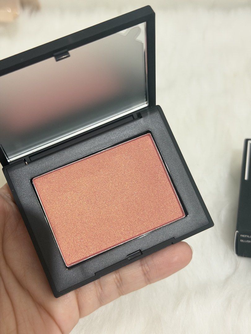 NARS Blush and Mini Blush Stick Set (Category: Makeup) located in Manila. Submitted by krystel.bk (Listing ID 1464771831, Image 3). Description: - Authentic NARS blush duo featuring the iconic peachy-pink shade with golden shimmer - Includes a full-size powder blush compact complete with a built-in mirror - Includes a convenient mini blush stick, perfect for on-the-go touch-ups - Ideal for both everyday makeup routines and travel - Condition: SWA