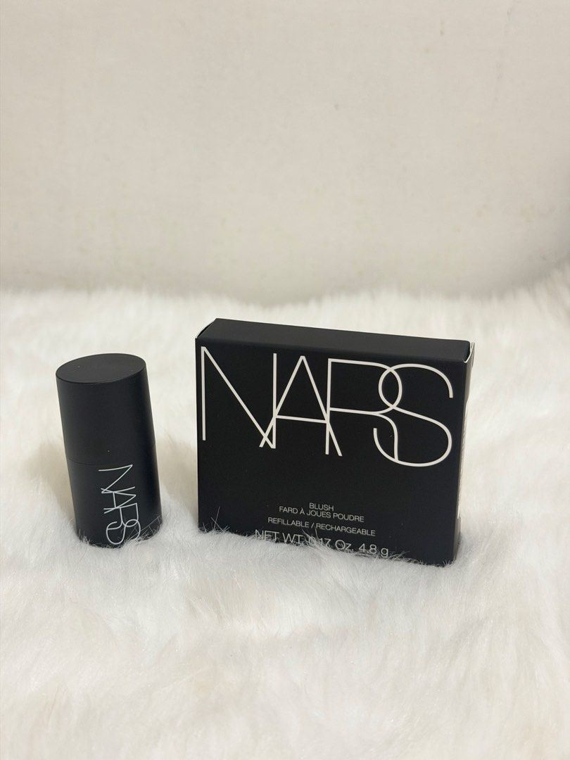 NARS Blush and Mini Blush Stick Set (Category: Makeup) located in Manila. Submitted by krystel.bk (Listing ID 1464771831, Image 1). Description: - Authentic NARS blush duo featuring the iconic peachy-pink shade with golden shimmer - Includes a full-size powder blush compact complete with a built-in mirror - Includes a convenient mini blush stick, perfect for on-the-go touch-ups - Ideal for both everyday makeup routines and travel - Condition: SWA