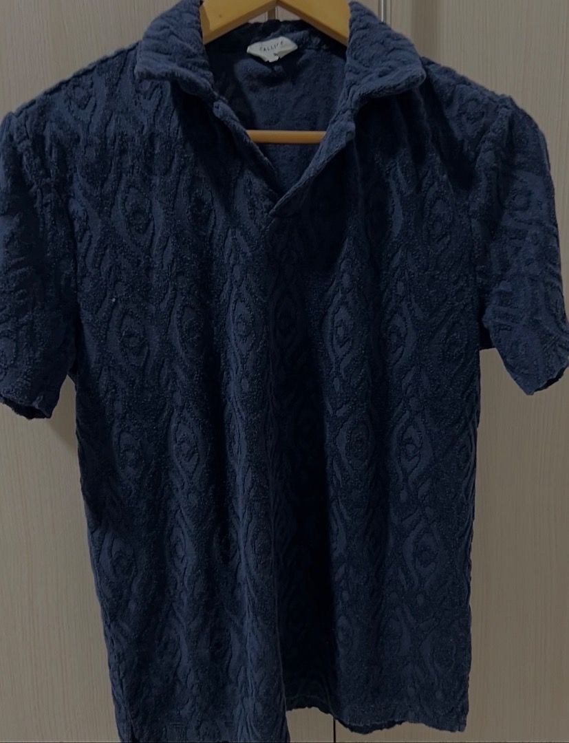 Navy Blue Textured Polo Shirt (Calliope) (Category: Tshirts & Polo Shirts ) located in Las Pinas. Submitted by copthesetops (Listing ID 1464930101, Image 1). Description: Worn and washed once, for reference 5’7 Lean body .