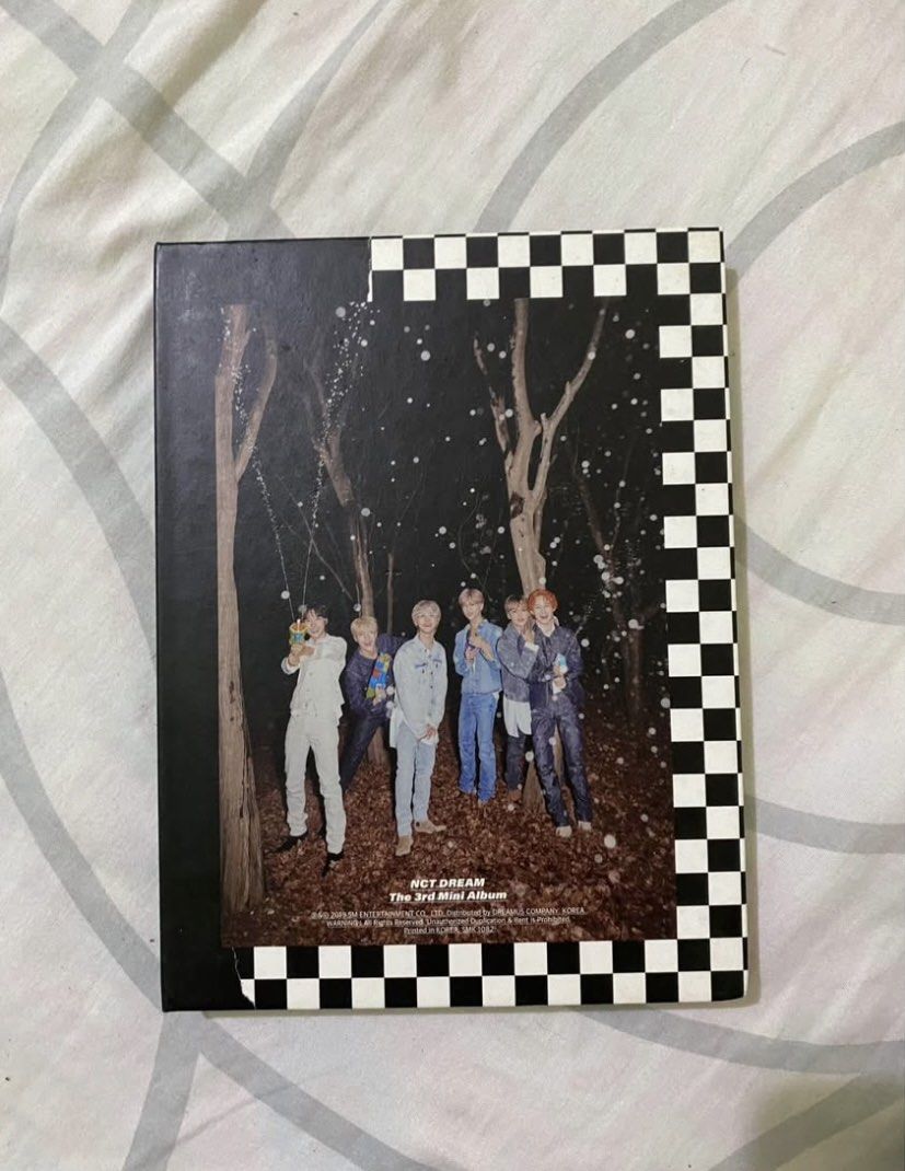 NCT Dream We Boom 3rd Mini Album (Category: CDs & DVDs) located in Manila. Submitted by hchnlvr (Listing ID 1464873840, Image 1). Description: - Album: NCT Dream The 3rd Mini Album (We Boom) - Condition: Excellent, includes everything shown in photos - Inclusions: CD, photo book cover, Jisung photocard, and Jaemin transparent bookmark - ISSUES: scratches / dents on the outside.
