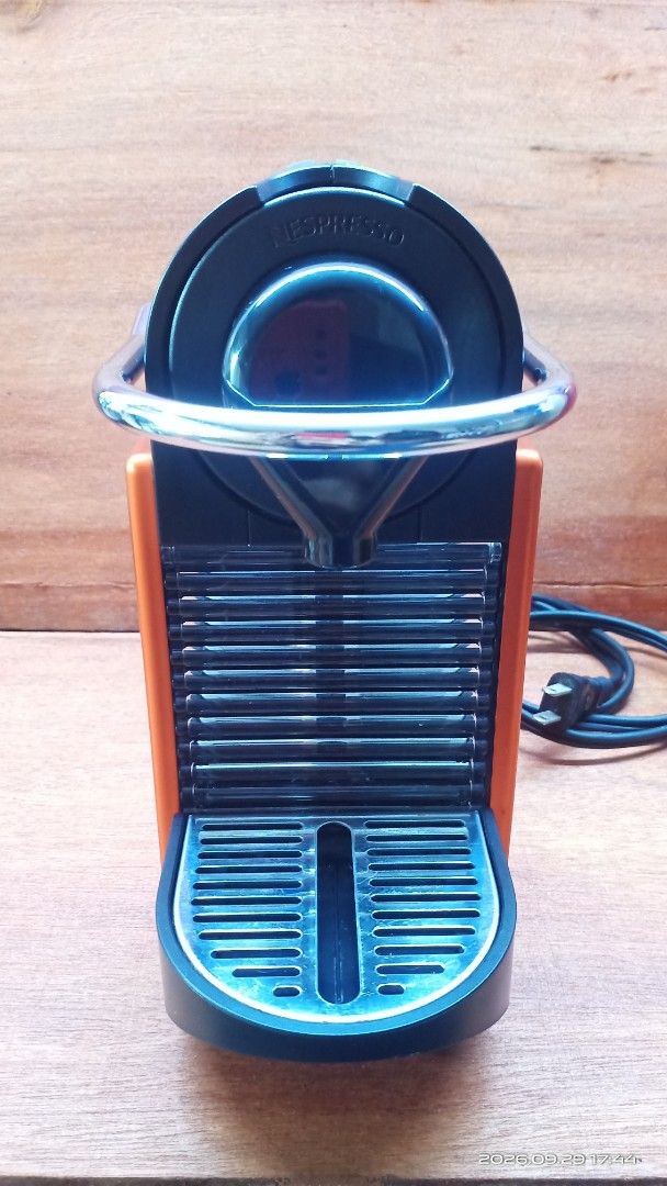 Nespresso Pixie Espresso ORANGE RED (Category: Coffee Machines & Makers) located in Malabon City. Submitted by nikko_leo05 (Listing ID 1464896526, Image 2). Description: -pre loved - nespresso pixie from japan 110V - 6200 only no issue - Model: Nespresso Pixie red 110v - Color: ORANGE RED - ideal for small spaces - Clean, well-maintained, with brand new transformer stepdown SOLD AS PACKAGE the item is in good condition like new.