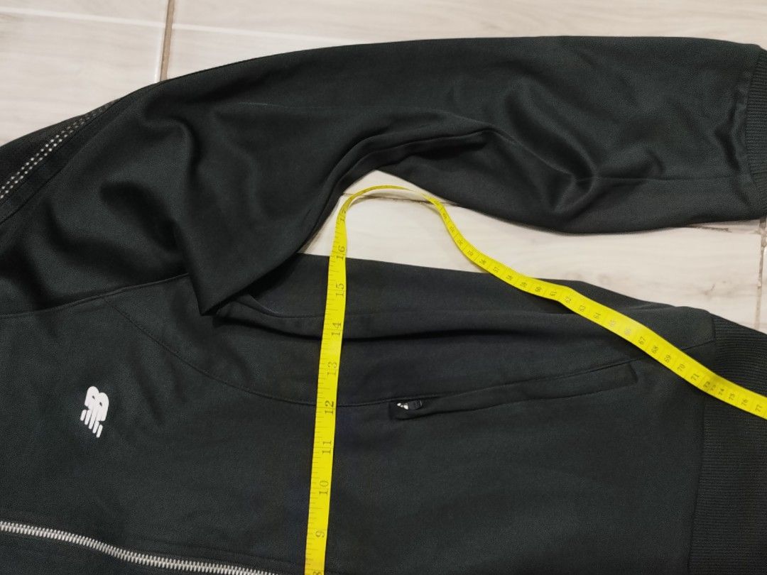 New Balance Black Track Jacket Zip Up (Category: Coats, Jackets and Outerwear) located in Caloocan City. Submitted by moneyhunt25 (Listing ID 1464852699, Image 3). Description: - Brand: New Balance - Color: Classic Black - Condition: Brand New - Features: Full zip closure, side zip pockets, ribbed cuffs and hem - Details: White NB logo on chest, subtle textured stripes on sleeves - Shipping: Fast shipping via J&T or Flash Express / Meet-ups avail