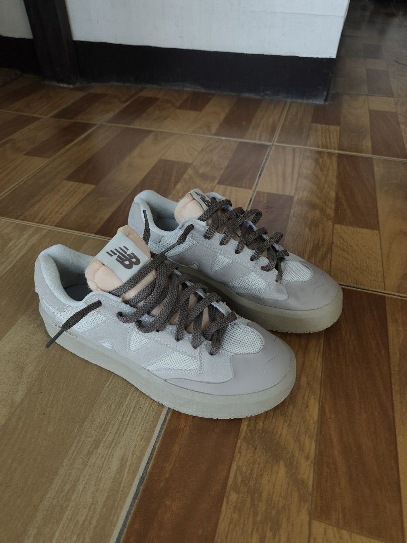 New Balance CT302 Shoes (Category: Sneakers) located in Davao. Submitted by mysticforest_0149b3 (Listing ID 1464816253, Image 2). Description: - Brand/Model: New Balance CT302 platform sneakers - Size: US 7 / EU 40 - Material/Color: Light grey mesh and suede upper with thick rubber soles - Details: Brown laces, exposed foam tongues, and original size tag inside - Condition: Clean soles with minimal wear, perfect for comfortable daily wear.