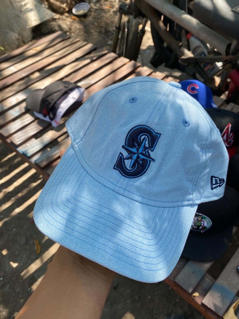 New Era 9Twenty Seattle Mariners Light Blue Baseball Cap (Category: Caps & Hats) located in Sibulan. Submitted by thethiftedcap0728 (Listing ID 1464887274, Image 1). Description: - Brand: New Era - Team: Seattle Mariners - Color: Light Blue - Style: 9Twenty Relaxed Fit Strapback - Condition: Brand new with price tag sticker underneath brim - Details: Embroidered front logo, interior tape branding, and official MLB genuine merchandise label.