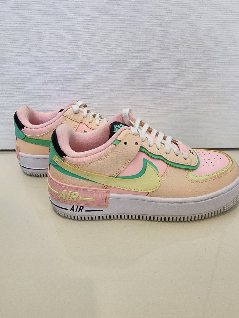 Nike Air Force 1 Shadow Arctic Punch Size 7.5 (Category: Sneakers) located in Quezon City. Submitted by pinkyshang (Listing ID 1464841377, Image 2). Description: - Brand/Model: Nike Air Force 1 Shadow "Arctic Punch" Size 7.5 - Colorway: Pastel mix of Soft Pink, Peach, Light Green and White - Key Features: Layered panels, double swooshes, chunky sole, pink laces with AF1 dubrae, black tongue label, and green heel overlay with embroidered Nike text