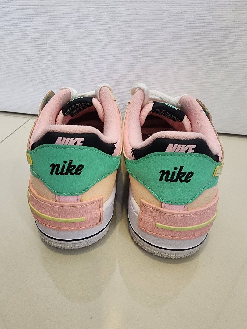 Nike Air Force 1 Shadow Arctic Punch Size 7.5 (Category: Sneakers) located in Quezon City. Submitted by pinkyshang (Listing ID 1464841377, Image 3). Description: - Brand/Model: Nike Air Force 1 Shadow "Arctic Punch" Size 7.5 - Colorway: Pastel mix of Soft Pink, Peach, Light Green and White - Key Features: Layered panels, double swooshes, chunky sole, pink laces with AF1 dubrae, black tongue label, and green heel overlay with embroidered Nike text