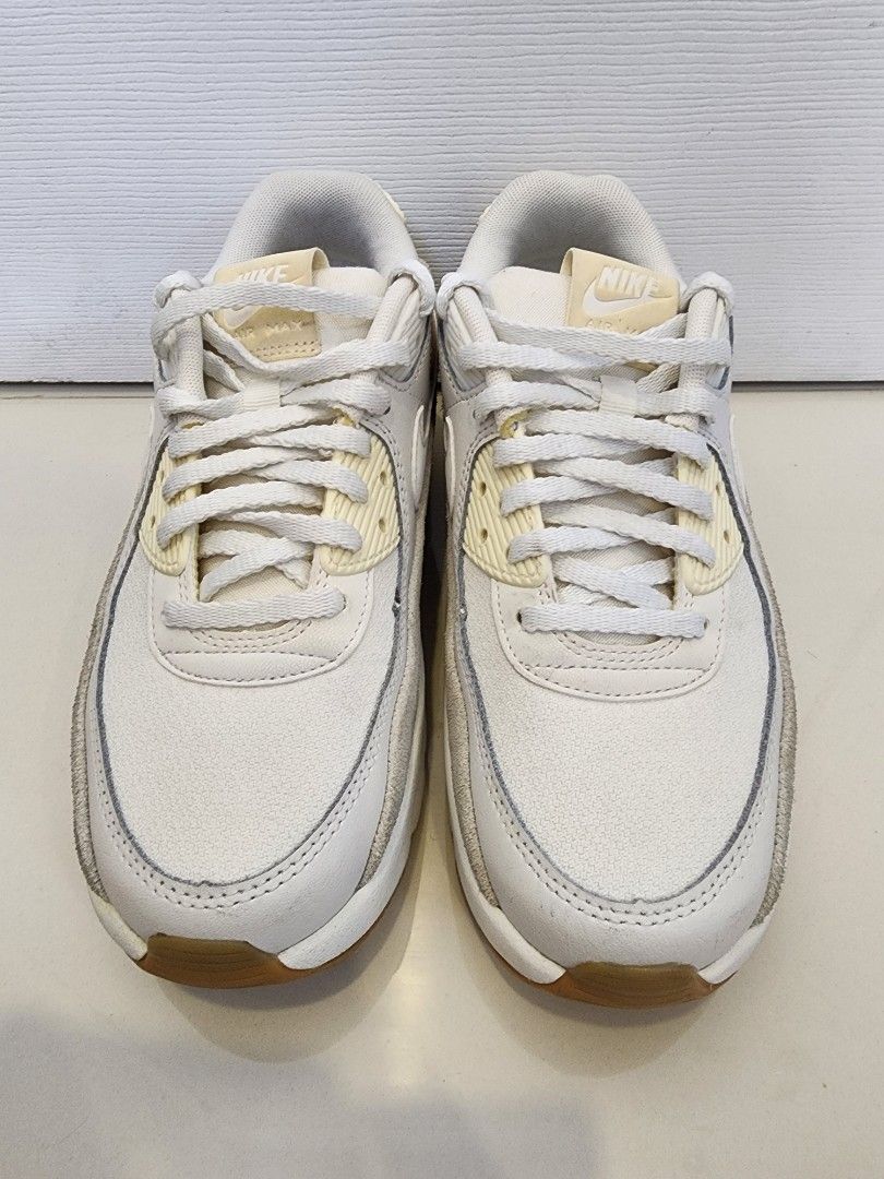 Nike Air Max 90 LV8 Size 7 (Category: Sneakers) located in Quezon City. Submitted by pinkyshang (Listing ID 1464837166, Image 1). Description: - Brand/Model: Nike Air Max 90 LV8 Size 7 - Colorway: Clean White and Cream - Materials: Classic leather and suede upper with gum rubber waffle outsole - Features: Visible Air unit in the heel for comfort and great grip - Condition: Overall clean uppers, strong tread on soles, and minor fading on the Nike 