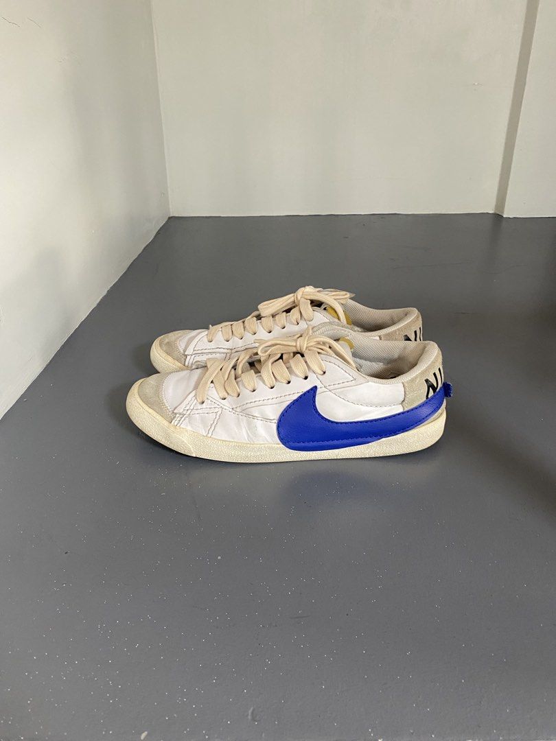 Nike Blazer Low Jumbo (Category: Sneakers) located in Pasig City. Submitted by silentgem-ac4d (Listing ID 1464918827, Image 1). Description: Size 10M. Still in good condition. - Model: Nike Blazer Low Jumbo - Colorway: White leather upper with bold oversized blue swooshes - Details: Off-white laces, vintage-style midsole, and exposed foam tongue - Features: Chunky heel pull tab with stamped Nike branding - Condition: Clean pair with minimal creas