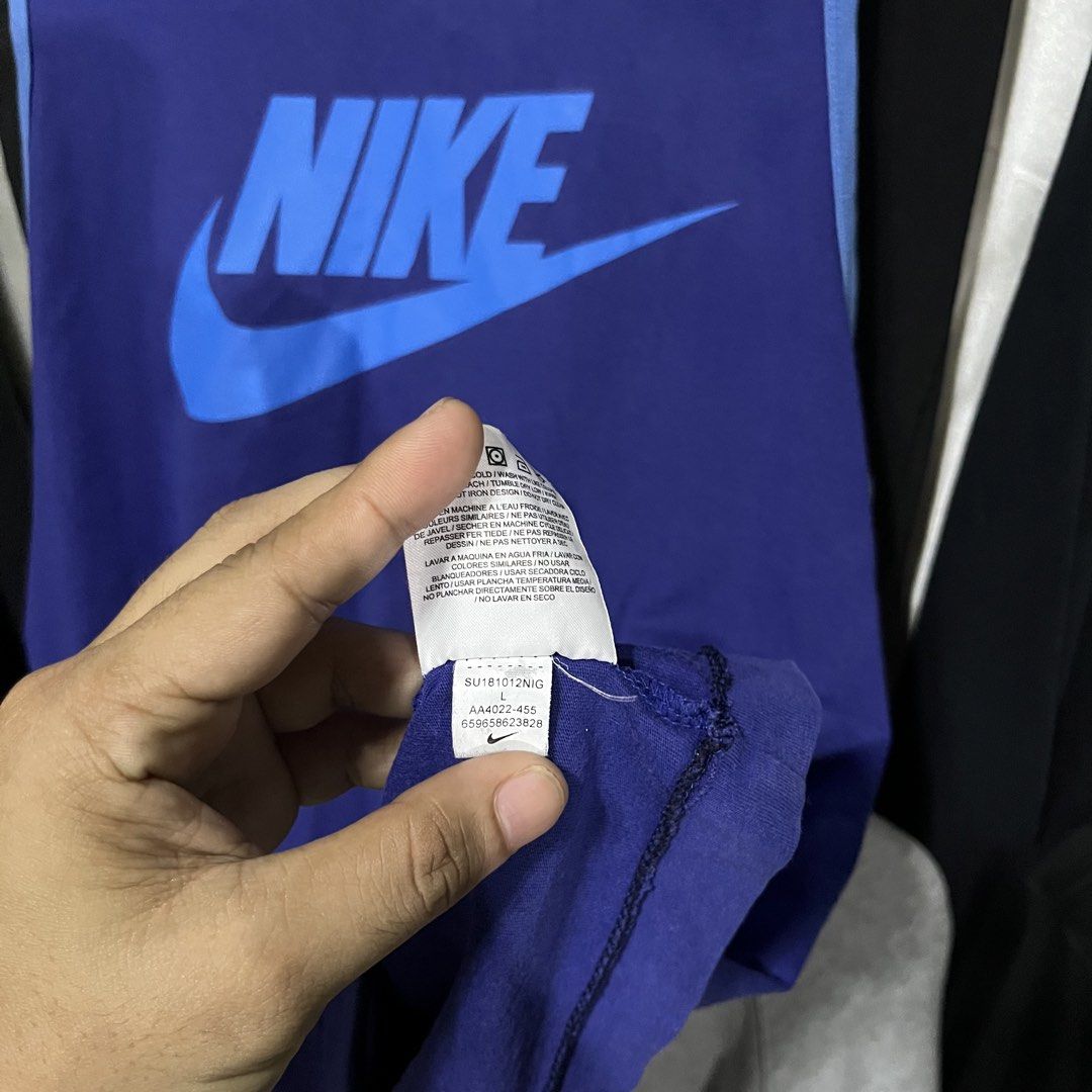 Nike Blue Tank Top Size L (Category: Sleeveless) located in Caloocan City. Submitted by ayogorenia1002 (Listing ID 1464944580, Image 3). Description: - Brand: Nike - Color: Royal blue with light blue trim - Size: Large - Design: Big Nike swoosh logo on the front chest - Condition: Clean and ready to wear - Ideal for: Workouts, gym sessions, or casual summer days.