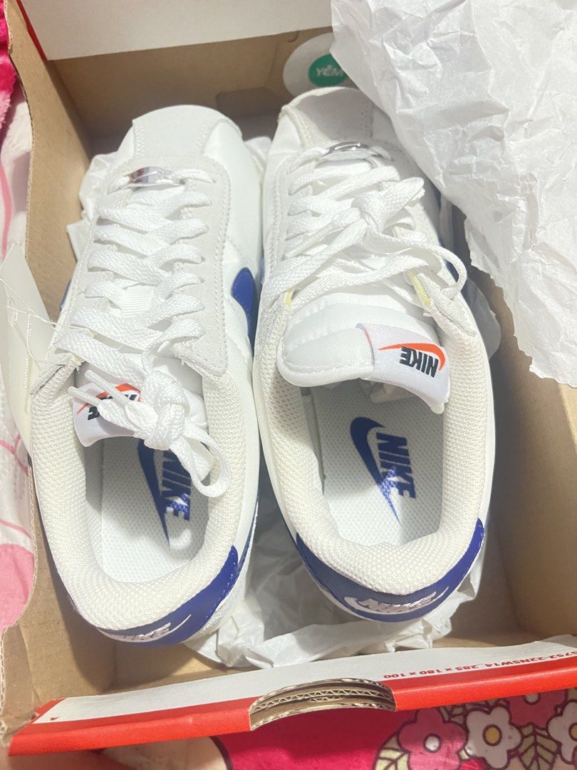 Nike Cortez White/Deep Night-Phantom DZ2795 102 (Category: Sneakers) located in Manila. Submitted by abeline07 (Listing ID 1464800898, Image 2). Description: - Brand: Nike Cortez - Color: White and Deep Night-Phantom Blue - Material: Classic nylon upper with suede overlays - Size: Women's US 7 / UK 4.5 / EUR 38 / CM 24 - Condition: Brand new, unworn with tags attached - Packaging: Comes with original box.