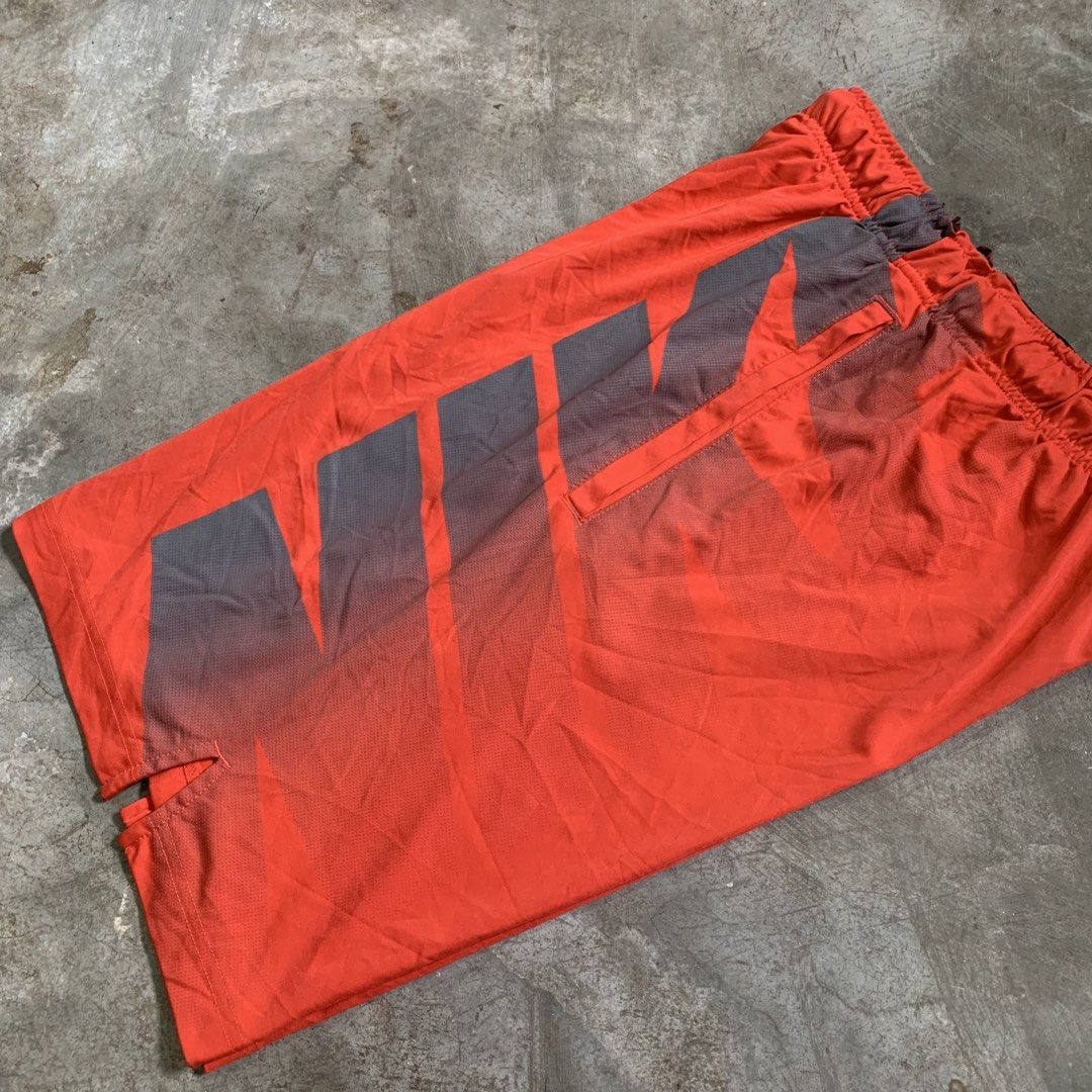 Nike Dri-FIT Orange Athletic Shorts (Category: Shorts) located in Manila. Submitted by emplysthrift. (Listing ID 1464905252, Image 2). Description: Actual dimes on tapemeasure Waist "29 to 32 Length "20 Good Condition Colorrate: 9.2/10 Flaws: minor heeldrag on gart part Unli vouch/vc for safe transactions 📲 Location: Laspinas City, Metro Manila, Brngy Talon Uno. 📍 DM IF INTERESTED📥 - Brand: Nike - Color: Bright orange with grey side panels - S