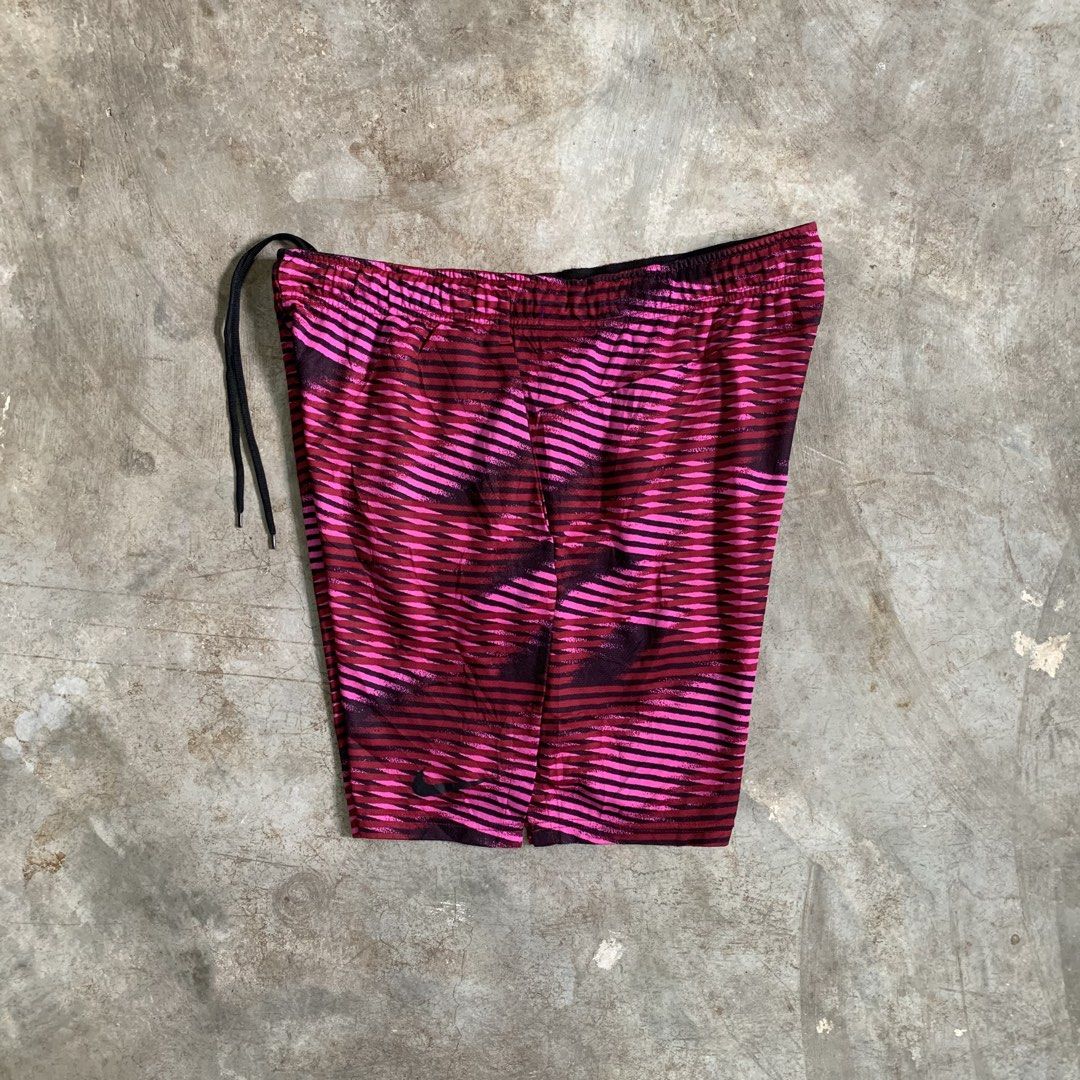 Nike Dri-FIT Pink Patterned Athletic Shorts XL (Category: Shorts) located in Manila. Submitted by emplysthrift. (Listing ID 1464909676, Image 1). Description: Waist "36.5 Length "18.5 Excellent Condition Colorrate: 9.5/10 Flaws: nine Unli vouch/vc for safe transactions 📲 Location: Laspinas City, Metro Manila, Brngy Talon Uno. 📍 DM IF INTERESTED📥 - Brand: Nike - Size: XL - Color/Pattern: Pink and dark red graphic stripe - Material: Dri-FIT mois