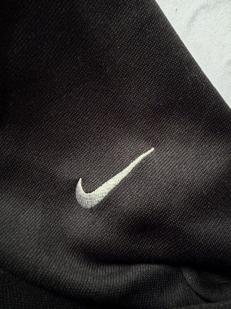 Nike Golf Leopard's Chase Half Zip Pullover (Category: Coats, Jackets and Outerwear) located in Santa Rosa. Submitted by itskllycstll (Listing ID 1464912201, Image 3). Description: - Brand: Nike Golf - Color: Black with grey inner collar and zipper piping - Material: Dri-FIT moisture-wicking fabric - Details: Leopard's Chase Golf Club embroidered logo on chest, white Nike swoosh on sleeve - Mobility: Shoulder vents with white stretch tape underne
