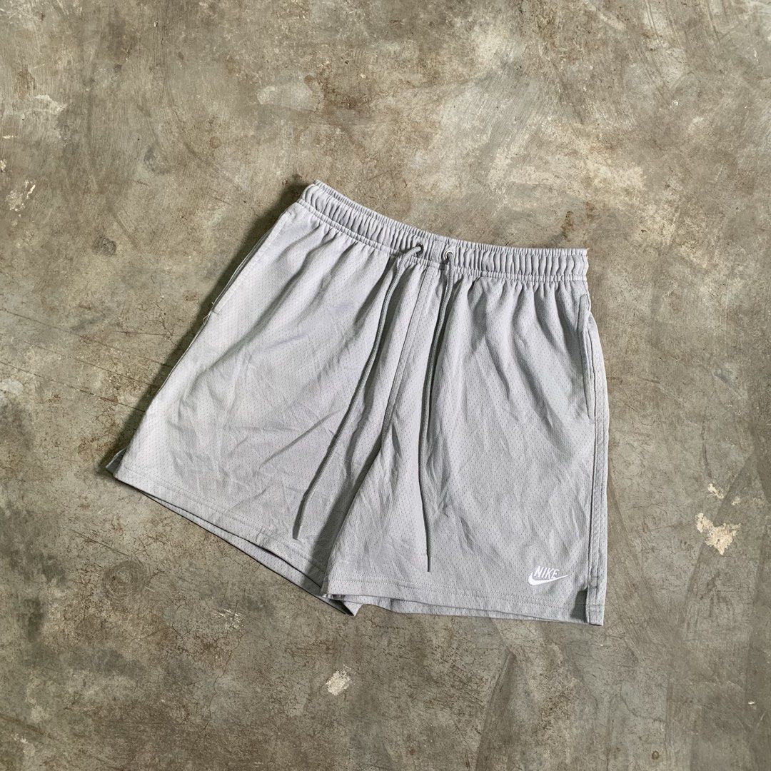 Nike grey mesh athletic shorts drawstring size S (Category: Shorts) located in Manila. Submitted by emplysthrift. (Listing ID 1464901933, Image 2). Description: Actual dimes on tapemeasure Waist "29.5 to 35 Length "16 Excellent Condition Colorrate: 9.5/10 Flaws: none Unli vouch/vc for safe transactions 📲 Location: Laspinas City, Metro Manila, Brngy Talon Uno. 📍 DM IF INTERESTED📥 Light grey Nike shorts made from breathable mesh fabric. Elastic 