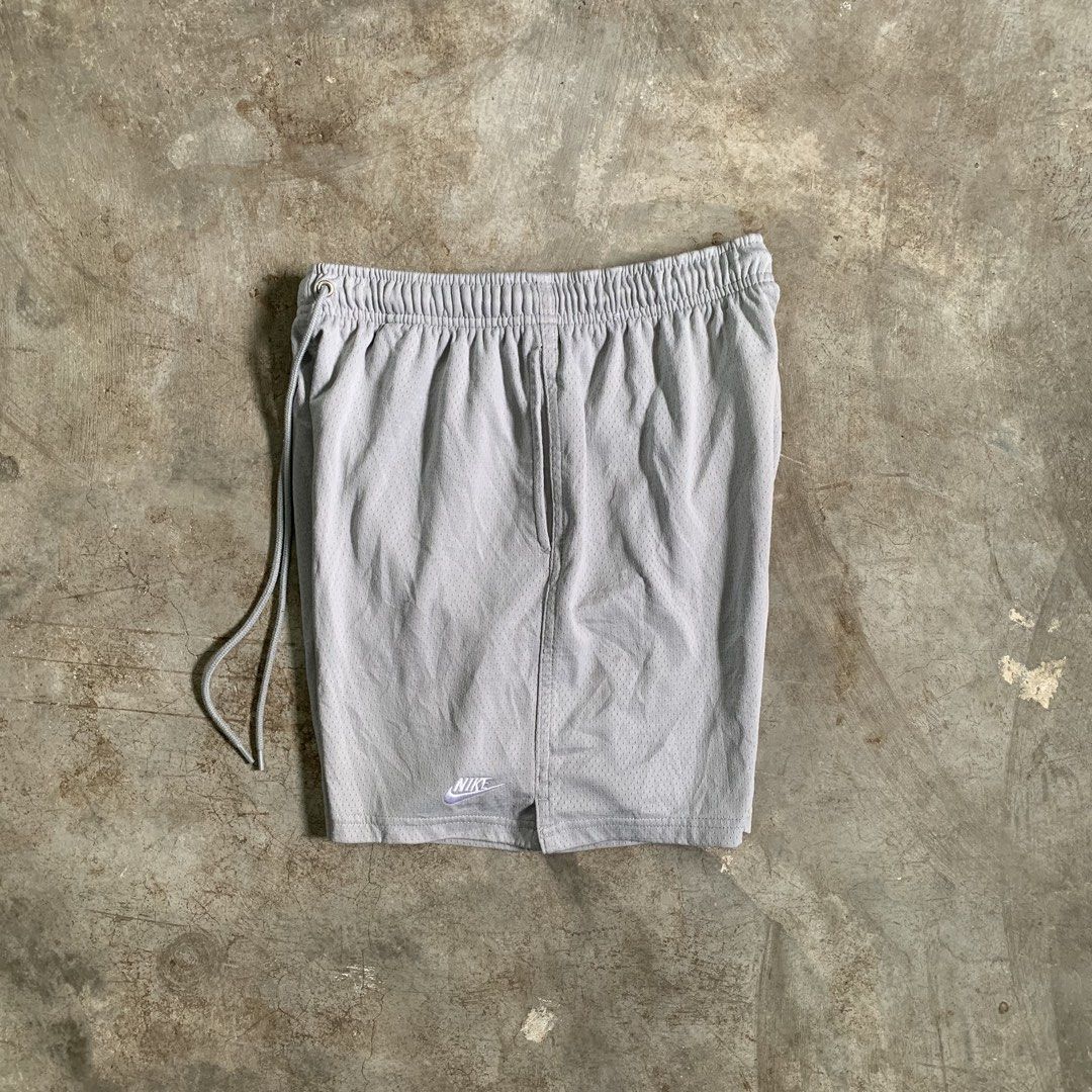 Nike grey mesh athletic shorts drawstring size S (Category: Shorts) located in Manila. Submitted by emplysthrift. (Listing ID 1464901933, Image 1). Description: Actual dimes on tapemeasure Waist "29.5 to 35 Length "16 Excellent Condition Colorrate: 9.5/10 Flaws: none Unli vouch/vc for safe transactions 📲 Location: Laspinas City, Metro Manila, Brngy Talon Uno. 📍 DM IF INTERESTED📥 Light grey Nike shorts made from breathable mesh fabric. Elastic 