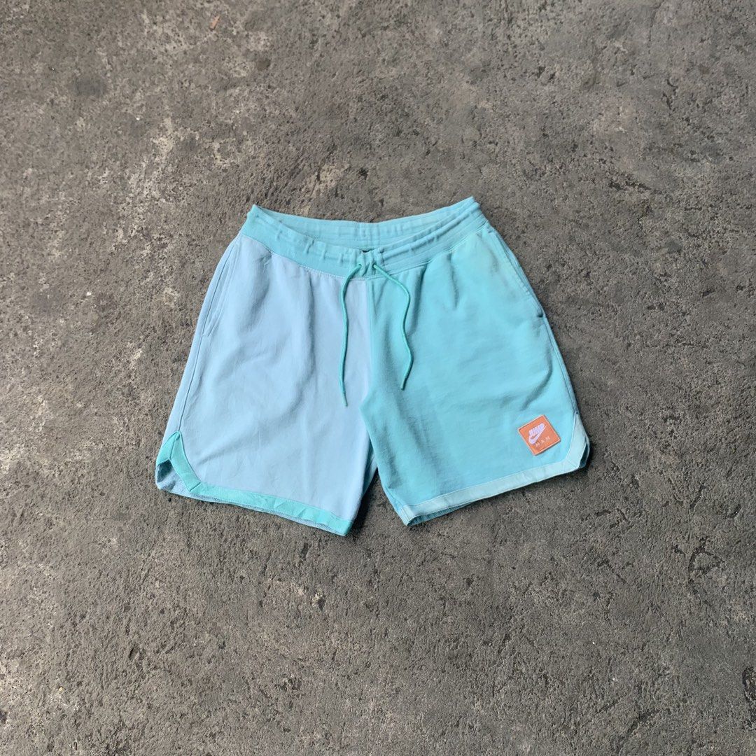 Nike Jordan Jumpman Two-Tone Blue Drawstring Shorts (Category: Shorts) located in Polangui. Submitted by b0ssl00ts (Listing ID 1464806067, Image 1). Description: - Brand: Jordan - Colorway: Two-tone light blue and teal - Material: Soft fleece-like cotton - Features: Elastic waistband with adjustable drawstring - Pockets: Deep pockets on both sides - Branding: Distinctive orange/white Jumpman patch on lower left leg and subtle white Jumpman embroi