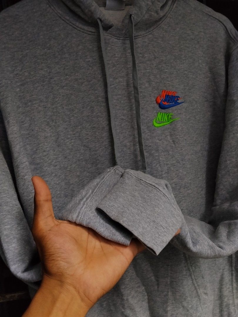 Nike Multiple Logo Gray Pullover Hoodie (Category: Coats, Jackets and Outerwear) located in Pasay City. Submitted by swoosh_collector (Listing ID 1464880797, Image 3). Description: Nike Multiple Logo Gray Pullover Hoodie •Size Large on Tag •Dimes W 22.5 | L 26 • Colorate 9.8/10 • Excellent Condition •No Flaws or Hidden Issues •Authentic/Original •Complete Tags DM for more info 📩.