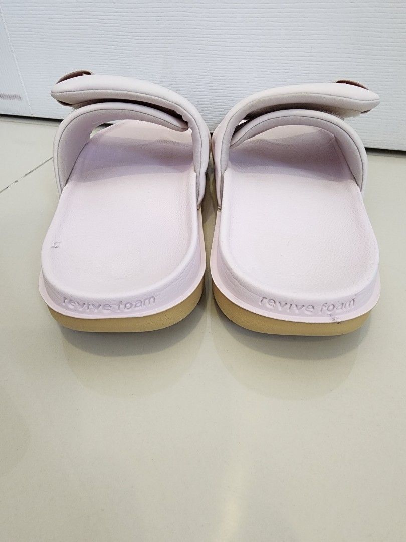Nike Offcourt Adjust Slides Size 7 (Category: Slippers and slides) located in Quezon City. Submitted by pinkyshang (Listing ID 1464896452, Image 3). Description: - Model: Nike Offcourt Adjust Slides Size 7 - Color: Pink - Style Code: DV1033-600 - Size: Women's US 7 / UK 4.5 / EUR 38 / CM 24 - Condition: Clean soles with slight wear on the inner footbeds - Features: Revive foam footbed, textured strap with velcro adjustment and circular traction o